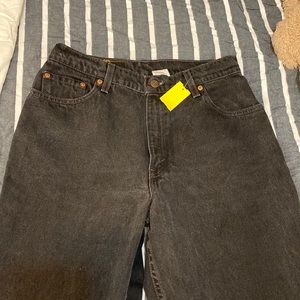 Vintage Levi’s | high waisted black 550s relaxed fit with tapered leg